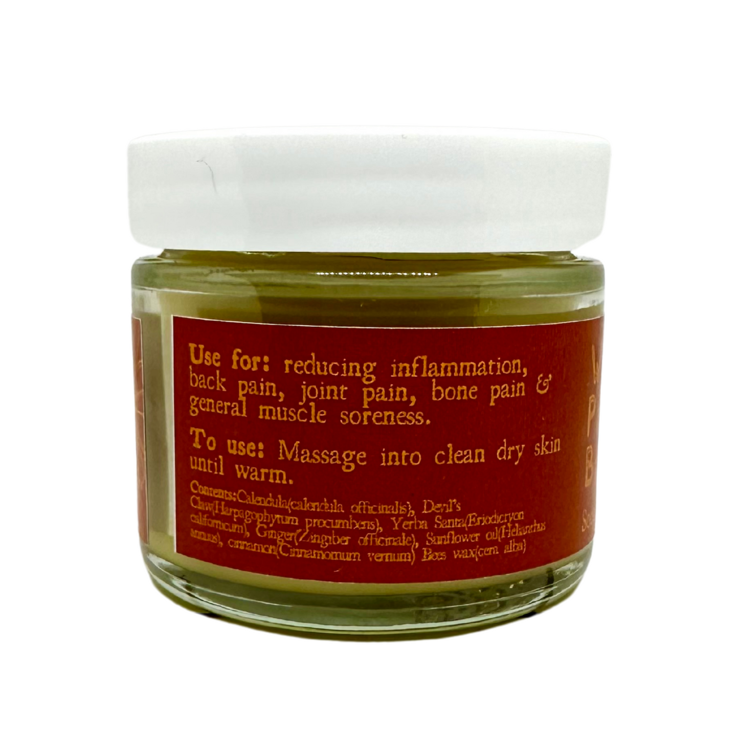 Clear glass jar with white lid and orange label with yellow writing