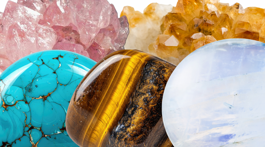 Turquoise, tigers eye, moon stone, rose quartz and citrine gemstones with a white background