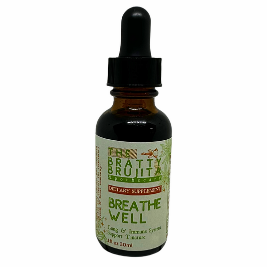 Brown bottle of 'Breathe Well' dietary supplement  lung and immune system support with black dropper and green label with text that says 'The Bratty Brujita' on a white background.